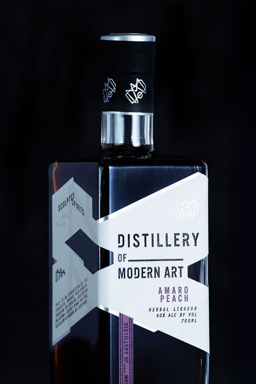https://distilleryofmodernart.com/wp-content/uploads/2025/07/Amaro-Peach-Label-Closeup-Black.jpg