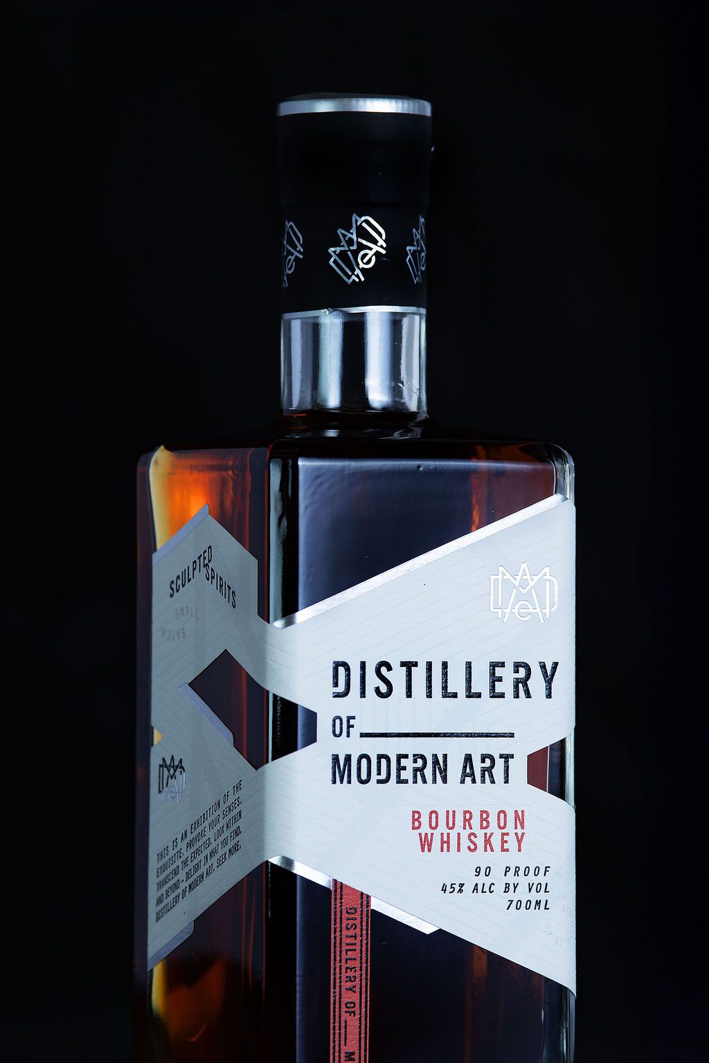https://distilleryofmodernart.com/wp-content/uploads/2025/07/Bourbon-Whiskey-Label-Closeup-Black.jpg
