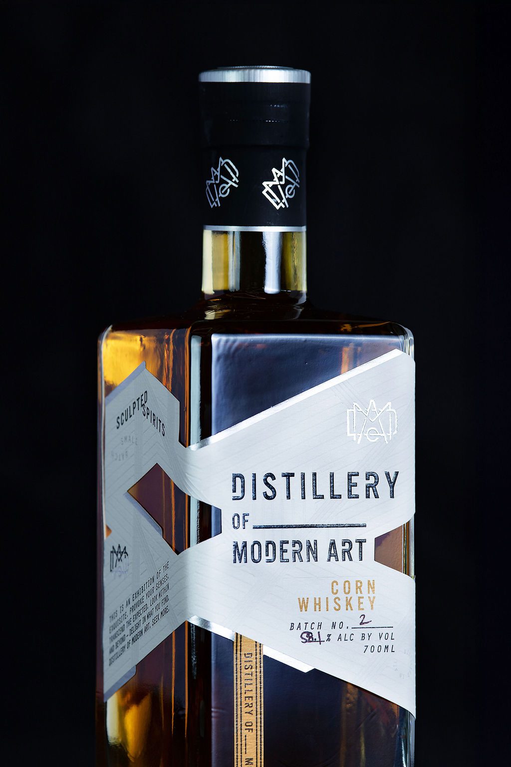 https://distilleryofmodernart.com/wp-content/uploads/2025/07/Corn-Whiskey-Label-Closeup-Black.jpg